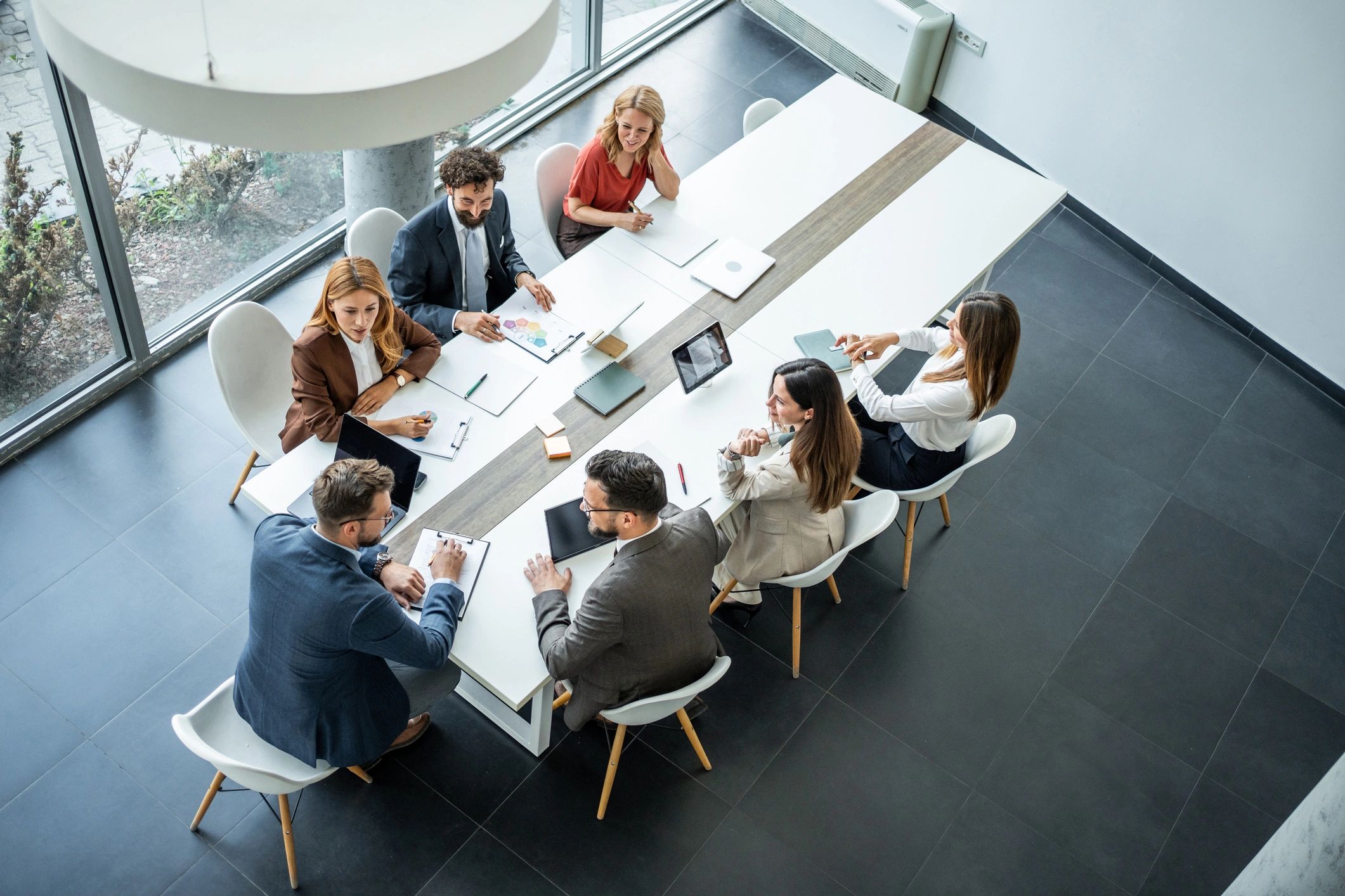 Professional business meeting representing trusted financial coordination