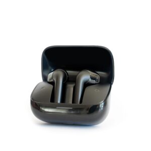 Black Wireless In Ear Phones Inside Charging Case, Isolated On White Background